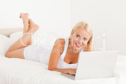 Blonde woman with a laptop