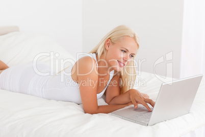 Cute woman using a laptop