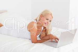 Cute woman using a laptop