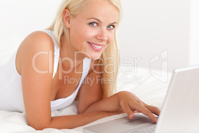 Close up of a woman with a laptop