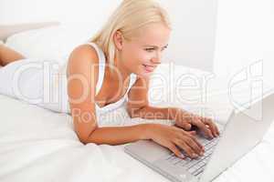 Gorgeous woman using a laptop