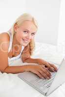 Portrait of a gorgeous woman with a laptop