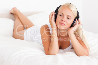 Blonde woman enjoying some music