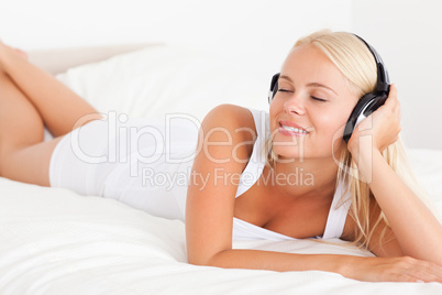 Delighted woman enjoying some music