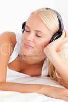 Portrait of a serene woman enjoying some music