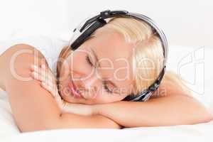 Close up of a quiet woman enjoying some music
