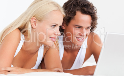 Young couple using a laptop