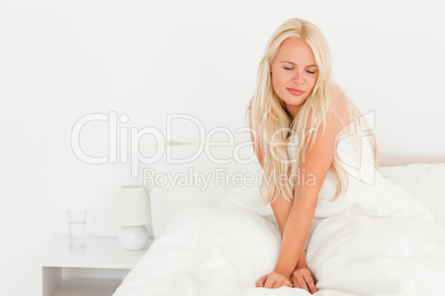 Blonde woman waking up