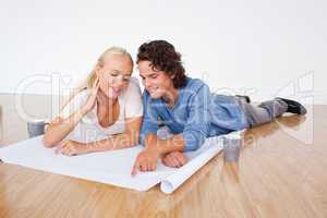 Young couple looking at a plan