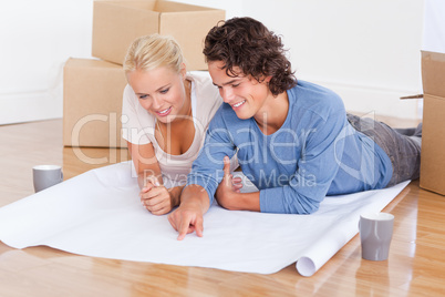 Young couple getting ready to move in a new house