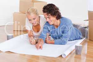 Young couple getting ready to move in a new house