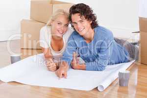 Couple getting ready to move in a new house