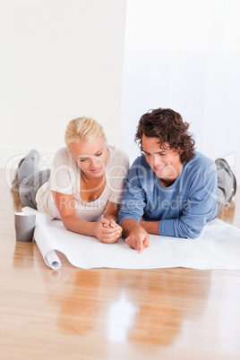 Portrait of a lovely couple organizing their new home
