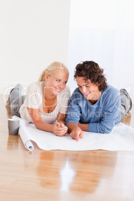 Portrait of a cute couple organizing their new home