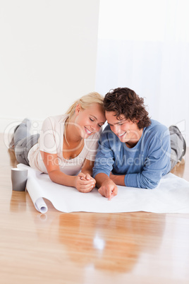 Portrait of a young couple organizing their new home