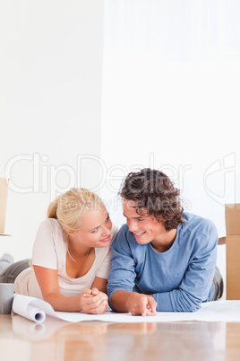 Portrait of an in love couple organizing their future home