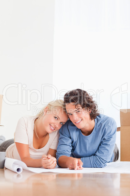 Portrait of a couple organizing their future home
