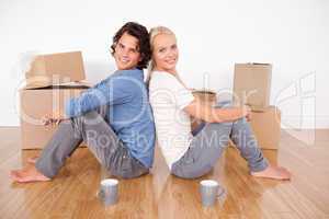 Couple sitting on the floor