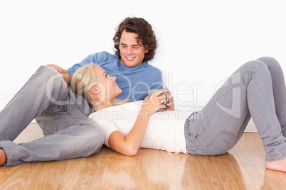 Young couple cuddling each other