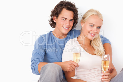 Couple with glasses of sparkling wine