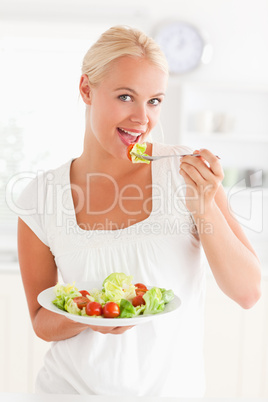 Woman eating a salad