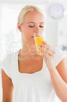 Portrait of a woman drinking juice