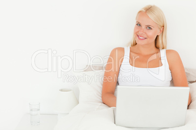 Lovely woman using a laptop