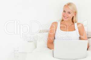 Lovely woman using a laptop