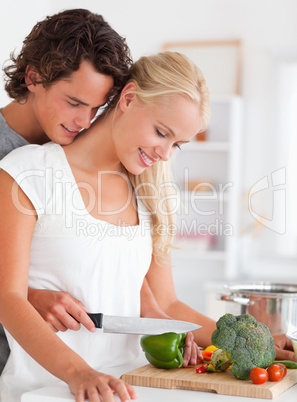 Portrait of a young couple cooking