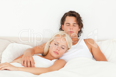 Calm couple sleeping