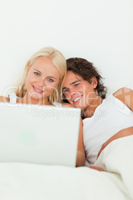 Portrait of a couple watching a movie