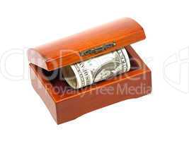 Wooden chest with dollars bill.