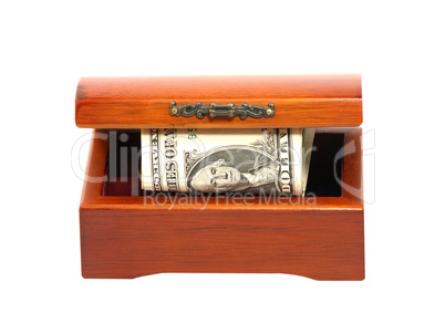 Old wooden chest with dollars bill isolated on white background.