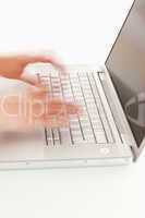 Blurred hands on keyboard