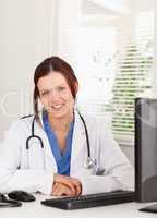 Female doctor smiling in office