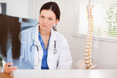 Female doctor holding a x-ray