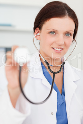 Pretty female doctor with stethoscope