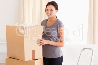 A woman with a cardboard