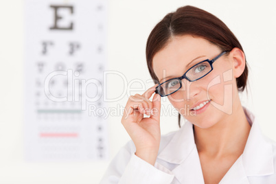 A female optician with glasses