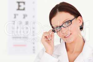 A female optician with glasses