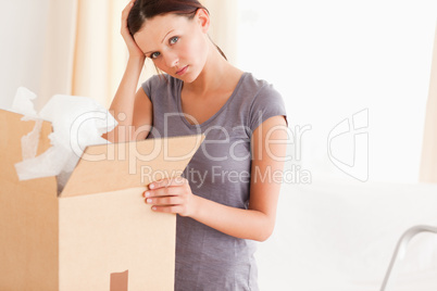 Woman with cardboard