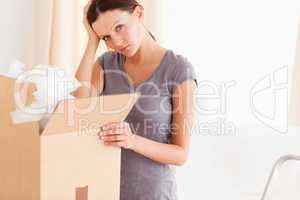 Woman with cardboard
