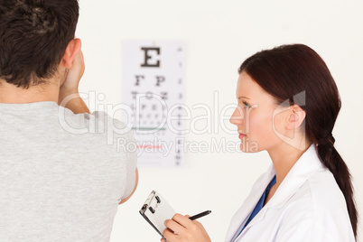 Female optician and man