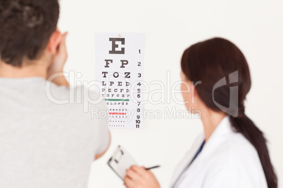 Female optician and patient