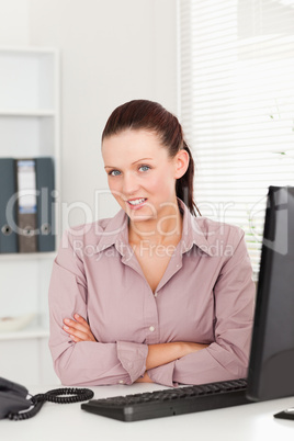Smiling businesswoman in her office