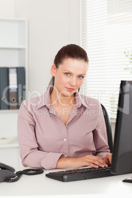 Businesswoman working in her office