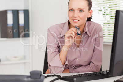 Businesswoman with glasses in office