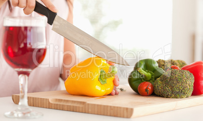 Woman cutting a pepper