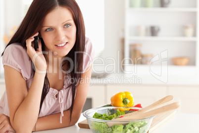 Smiling woman using a cellphone