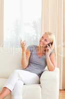 Portrait of a cheerful woman on the phone